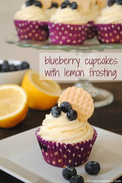 Blueberry Cupcakes with Lemon Cream Cheese Frosting - Lemon-flecked Greek yogurt blueberry cupcakes with lemon cream cheese frosting. | foxeslovelemons.com