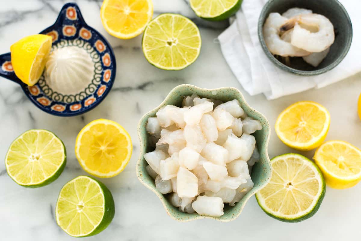 Fresh, healthy and easy! This Shrimp Ceviche recipe will wow as a restaurant-quality party appetizer that is so simple to make at home. | foxeslovelemons.com