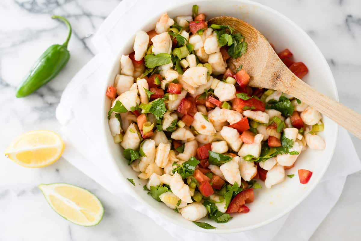 Fresh, healthy and easy! This Shrimp Ceviche recipe will wow as a restaurant-quality party appetizer that is so simple to make at home. | foxeslovelemons.com