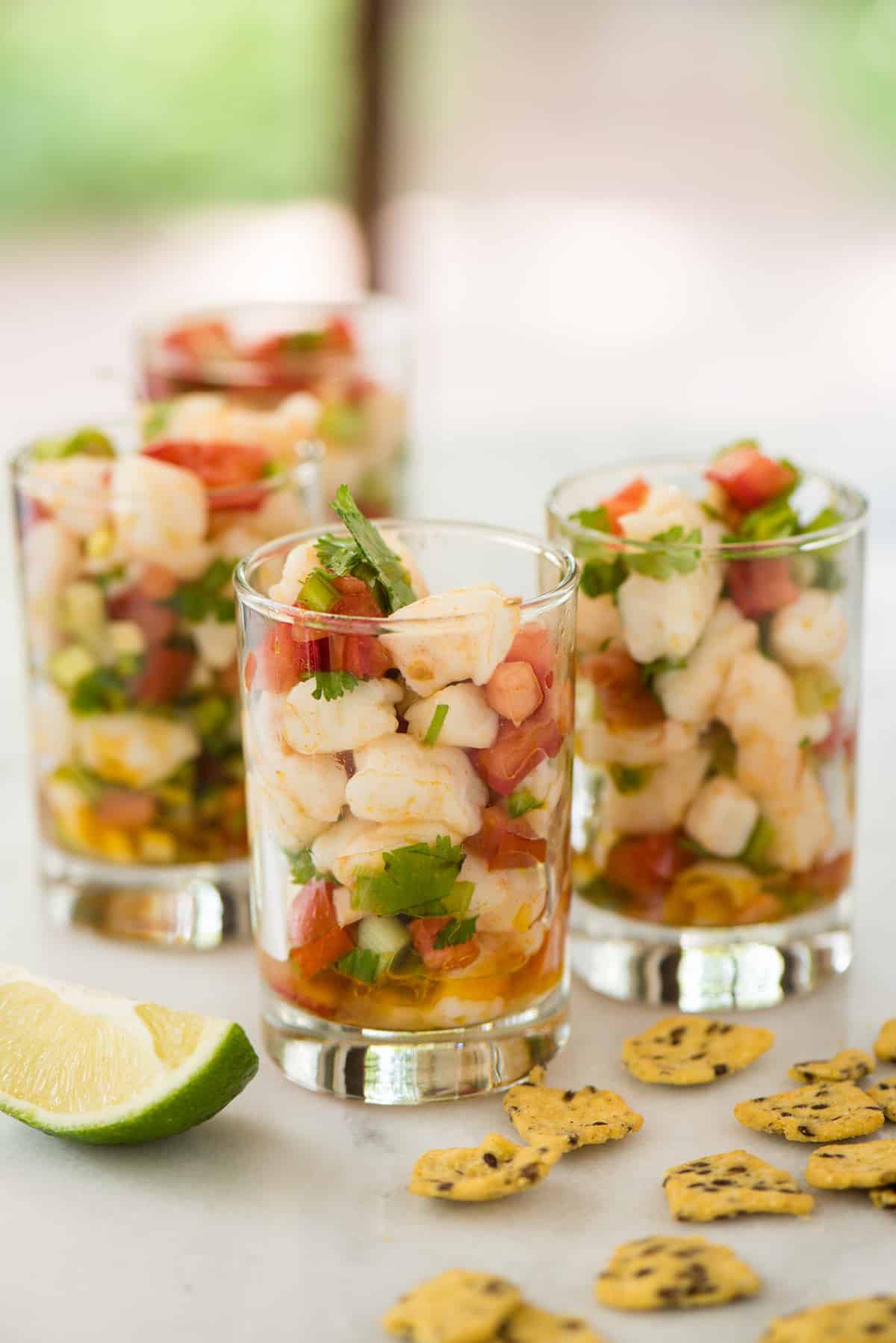 Fresh, healthy and easy! This Shrimp Ceviche recipe will wow as a restaurant-quality party appetizer that is so simple to make at home. | foxeslovelemons.com