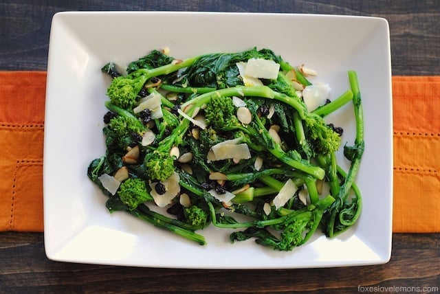 Almond Broccolini Salad – A cold, wholesome salad with broccolin, parmesan, currants, almonds and lemon vinaigrette. | foxeslovelemons.com