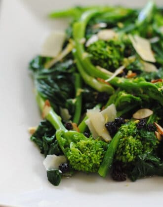Almond Broccolini Salad – A cold, wholesome salad with broccolin, parmesan, currants, almonds and lemon vinaigrette. | foxeslovelemons.com