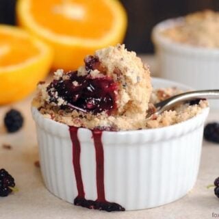 Gingered Mulberry-Orange Crumble with Pecan Crunch - the perfect quick dessert for an abundance of summer berries. Can also be made with blackberries, blueberries or raspberries! | foxeslovelemons.com