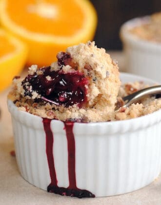 Gingered Mulberry-Orange Crumble with Pecan Crunch - the perfect quick dessert for an abundance of summer berries. Can also be made with blackberries, blueberries or raspberries! | foxeslovelemons.com