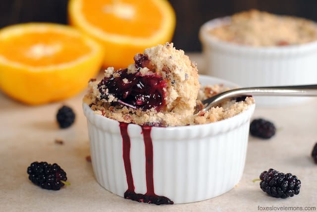 Gingered Mulberry-Orange Crumble with Pecan Crunch - the perfect quick dessert for an abundance of summer berries. Can also be made with blackberries, blueberries or raspberries! | foxeslovelemons.com
