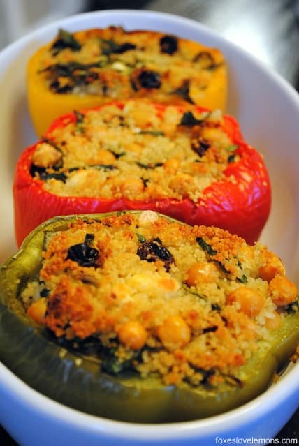 Couscous-Stuffed Peppers with Basil Sauce - a filling vegetarian meal that will even satisfy meat-eaters! From Giada De Laurentiis. | foxeslovelemons.com