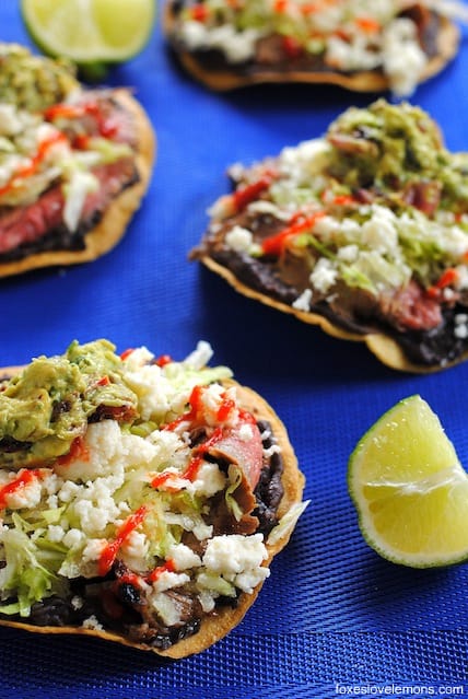 Flank Steak Tostadas – a quick and easy weeknight meal featuring grilled flank steak, black beans and queso fresco. | foxeslovelemons.com