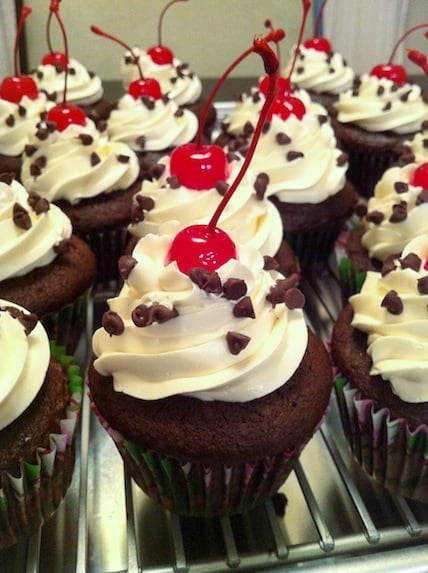 Black Forest Cupcakes - using devil's food cake mix and cherry pie filling, these cute sweet treats couldn't be simpler! Recipe originally from CookiesCakesPiesOhMy. | foxeslovelemons.com