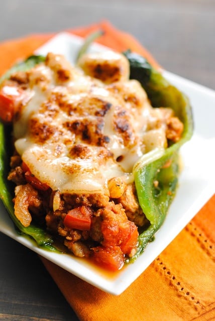 Picadillo Stuffed Chiles Rellenos - roasted poblano peppers stuffed with Cuban pork picadillo. | foxeslovelemons.com