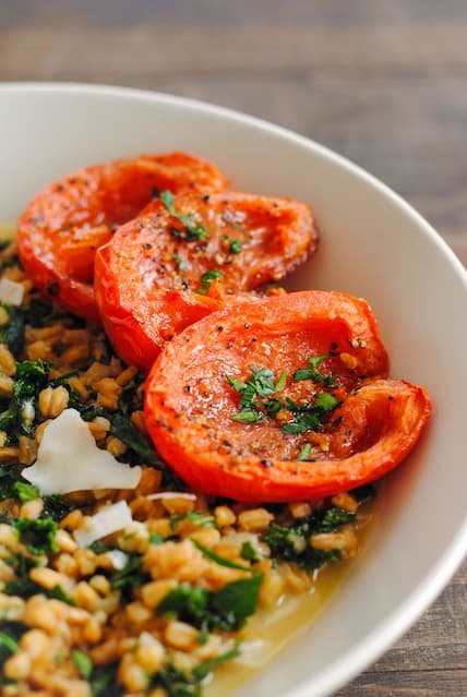 Farro and Kale Risotto with Roasted Tomatoes | www.foxeslovelemons.com