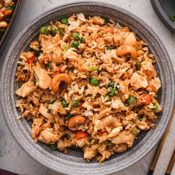 A grey bowl filled with easy chicken fried rice.