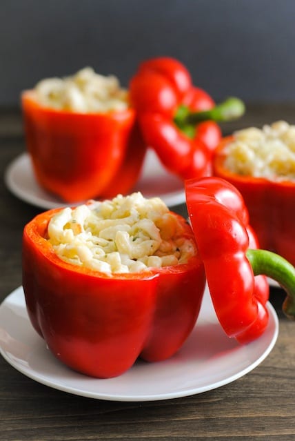 Italian Mac & Cheese Stuffed Peppers - Creamy pasta with lots of cheese and herbs stuffed into red peppers and roasted. | foxeslovelemons.com