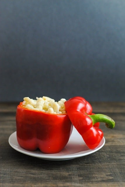 Italian Mac & Cheese Stuffed Peppers - Creamy pasta with lots of cheese and herbs stuffed into red peppers and roasted. | foxeslovelemons.com