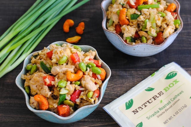 Sriracha Cashew Chicken Fried Rice - brown rice, lots of veggies and chicken make this a colorful and flavorful wok meal! | foxeslovelemons.com