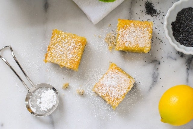 https://foxeslovelemons.com/wp-content/uploads/2014/03/Meyer-Lemon-Bars-with-Poppyseed-Crust4.jpg