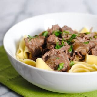 Slow Cooker Beef Stroganoff - Rich and creamy beef and mushroom stroganoff with egg noodles. Let your crock pot do all the work! | foxeslovelemons.com