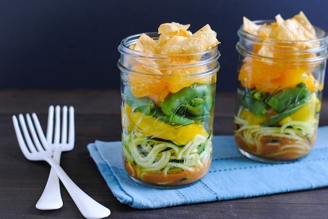 Asian Zoodle Salad Jars - Spiralized zucchini noodles, yellow bell pepper, sugar snap peas, mandarin oranges, crunchy wonton strips and sesame-ginger dressing. A portable and healthful make-ahead lunch! | foxeslovelemons.com