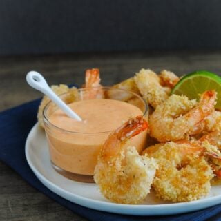 Baked Coconut Shrimp with Creamy Sweet Chili Sauce - A light and delicious restaurant-quality meal or appetizer that comes together in just minutes! | foxeslovelemons.com