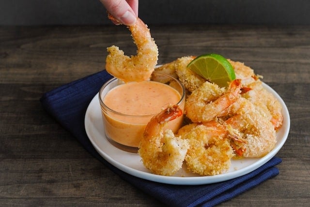 Baked Coconut Shrimp with Creamy Sweet Chili Sauce - A light and delicious restaurant-quality meal or appetizer that comes together in just minutes! | foxeslovelemons.com