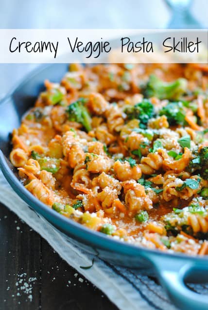 Creamy Veggie Pasta Skillet - A hearty vegetarian meal that comes together in one skillet. Creamy pasta loaded with carrots, broccoli and peas. | foxeslovelemons.com