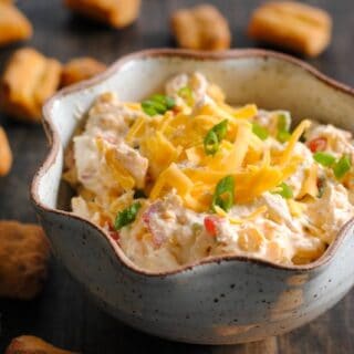 Lightened-Up Pimento Cheese Dip - Nobody will know this cheesy and tangy dip is lightened-up with Greek yogurt! | foxeslovelemons.com
