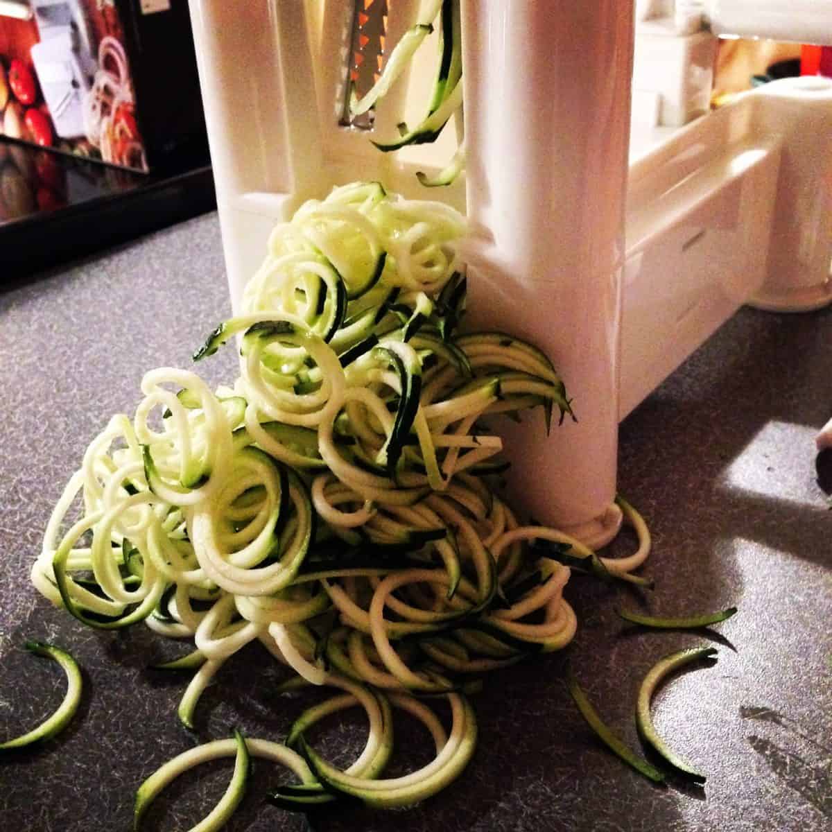 Asian Zoodle Salad Jars - Spiralized zucchini noodles, yellow bell pepper, sugar snap peas, mandarin oranges, crunchy wonton strips and sesame-ginger dressing. A portable and healthful make-ahead lunch! | foxeslovelemons.com