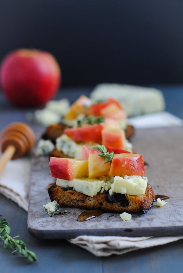 Raisin Crostini with Blue Cheese & Apples - Sweet, savory and cheesy. A pretty party bite that is a cinch to pull together! | foxeslovelemons.com