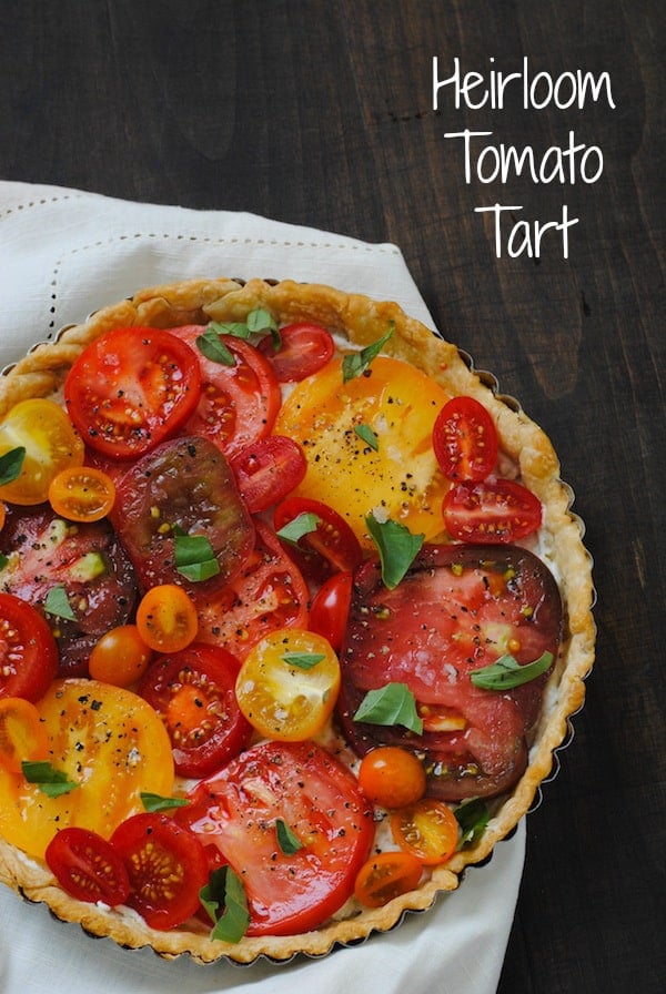 Heirloom Tomato Tart - A beautiful savory tart layered with a ricotta, blue cheese and fresh tomatoes. | foxeslovelemons.com