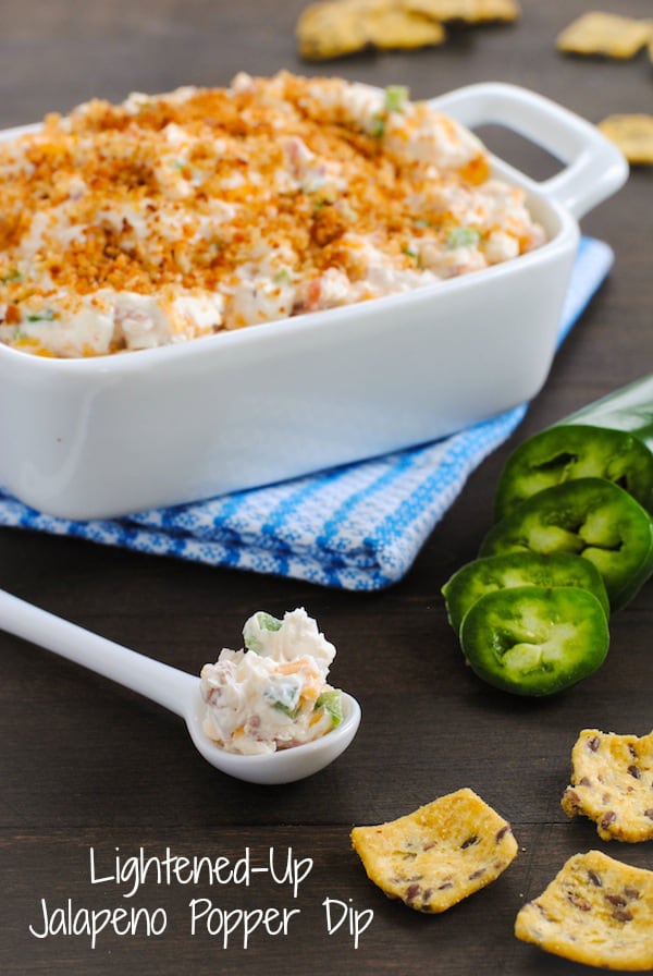 Lightened-Up Jalapeño Popper Dip - Perfect for tailgating and game-watching parties! All the flavors of a jalapeño popper, lightened-up in a dip made with Greek yogurt, turkey bacon, Cheddar cheese and a crunchy breadcrumb topping. | foxeslovelemons.com