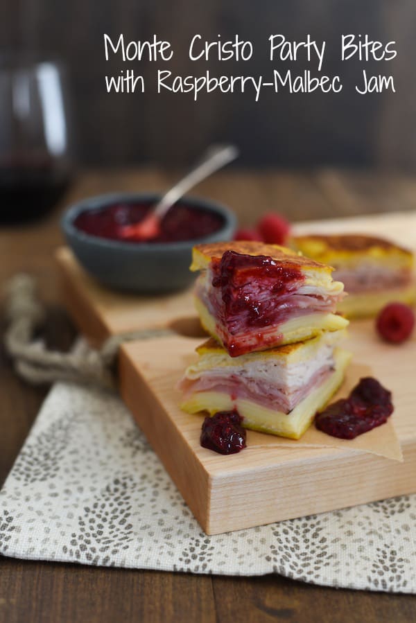 Monte Cristo Party Bites with Raspberry-Malbec Jam - The classic diner sandwich dressed up as a fancy appetizer! Griddled sandwiches filled with ham, turkey and fontina cheese, with a side of homemade jam for dipping! | foxeslovelemons.com