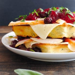 Thanksgiving Leftover Waffles - Savory buttermilk and herb waffles topped with Havarti cheese, and leftover turkey and cranberries! | foxeslovelemons.com