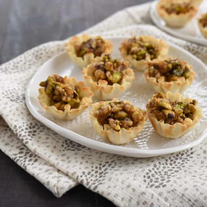 Easy 3-Step Baklava Tarts - All the flavor of baklava, in bite-sized tarts that take just minutes to make! | foxeslovelemons.com