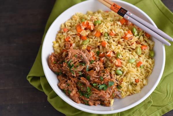 Slow Cooker Asian-Style Pulled Pork - A flavorful pulled pork that can be served in sandwiches, or with a side of rice! | foxeslovelemons.com