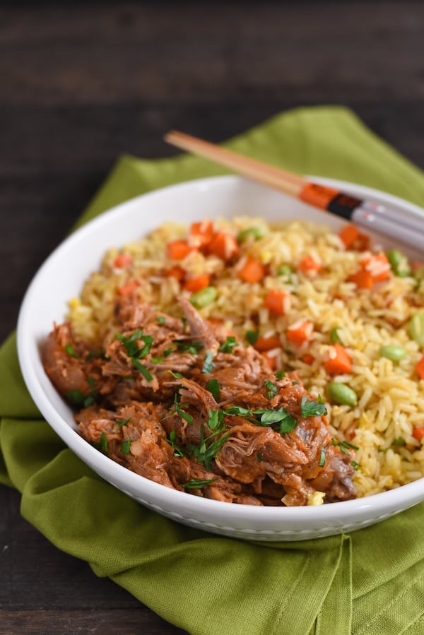 Slow Cooker Asian-Style Pulled Pork - A flavorful pulled pork that can be served in sandwiches, or with a side of rice! | foxeslovelemons.com