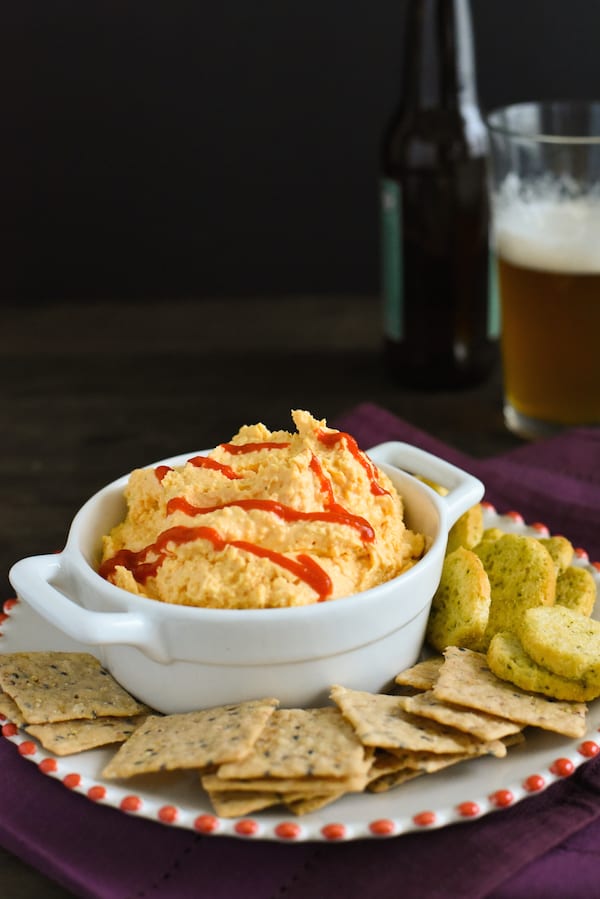 Spicy Beer Cheese Dip - A party favorite! Dip a cracker into it, or spread it on a sandwich! | foxeslovelemons.com