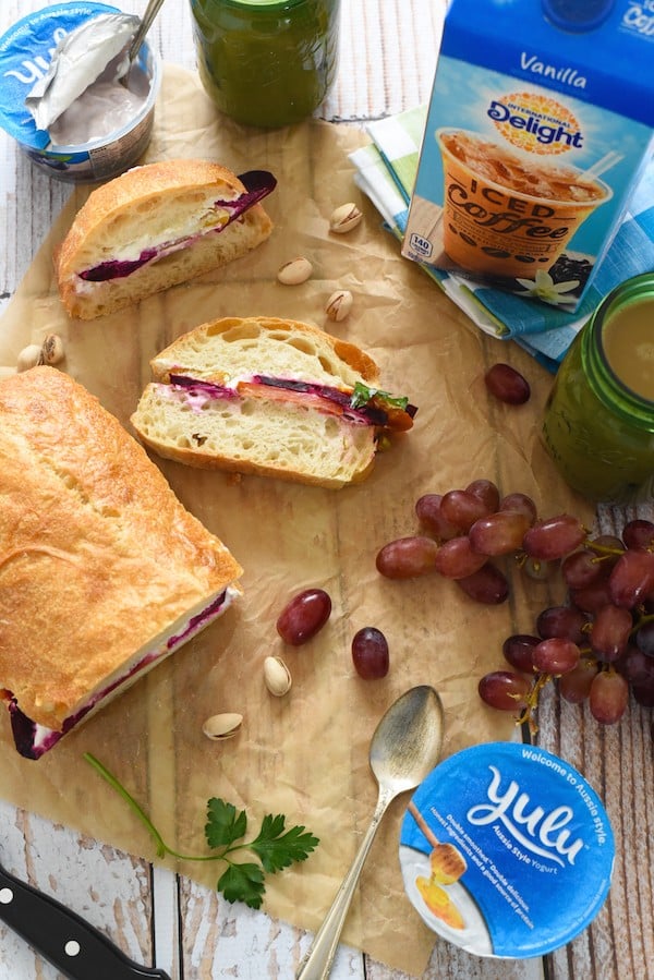 Beet, Blue Cheese & Pistachio Picnic Sandwich - Roasted beets, homemade blue cheese spread, pistachios and parsley on a big loaf of ciabatta bread. Slice and serve at a picnic or party, or eat for lunches throughout the week! | foxeslovelemons.com