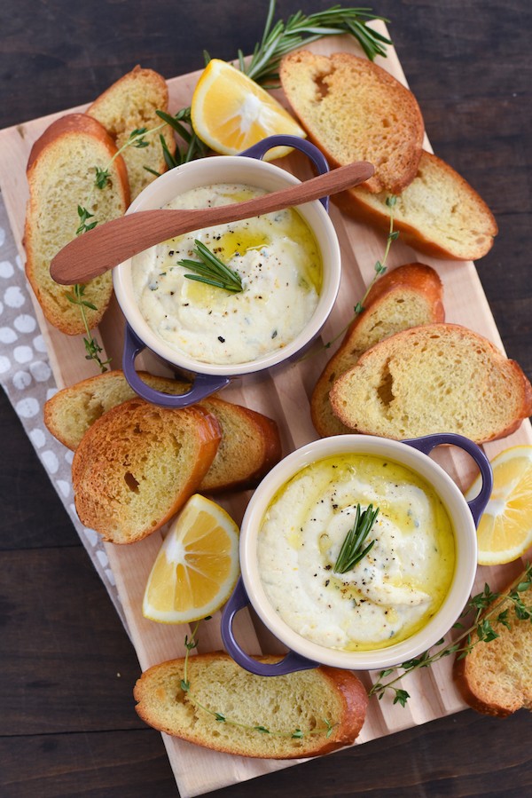 Meyer Lemon Baked Ricotta - A simple yet elegant hot appetizer that is perfect for parties. Simply stir together ricotta cheese, Meyer lemon zest and juice, herbs and seasoning, and pop it into the oven! | foxeslovelemons.com
