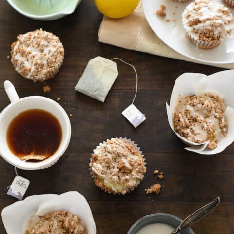 Lemon Earl Gray Streusel Muffins - Coffee cake-inspired muffins, infused with the flavors of tea and lemon zest. Topped with a simple brown sugar streusel and lemony glaze, they are perfect for breakfast or dessert! | foxeslovelemons.com