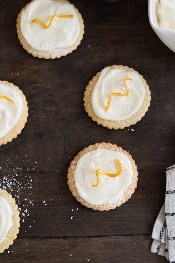 Bourbon Old Fashioned Cocktail Cookies - All the flavors of an Old Fashioned cocktail in a cookie. Sugar cookies flavored with orange zest, topped with bourbon cream cheese frosting! | foxeslovelemons.com