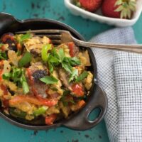 Brat & Pepper Breakfast Scramble - Perfect for Father's Day! A ballpark-inspired egg scramble featuring grilled brats, peppers, onions and cheddar cheese! | foxeslovelemons.com