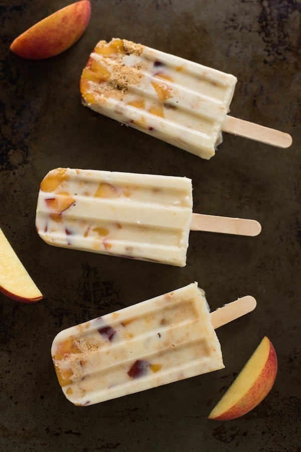 Peach Pie Ice Cream Bars - An irresistible combination of fresh peaches, crumbled pie crust and creamy frozen custard. | foxeslovelemons.com