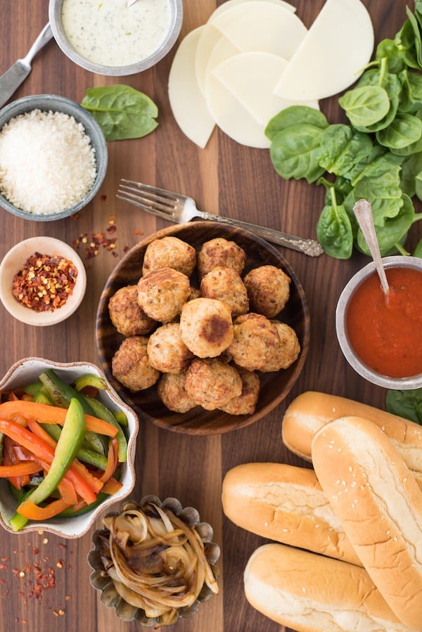 Build-Your-Own Meatball Sub Platter - Pile all the fixings for delicious meatball subs onto a big platter, and let everybody create their own meal! | foxeslovelemons.com