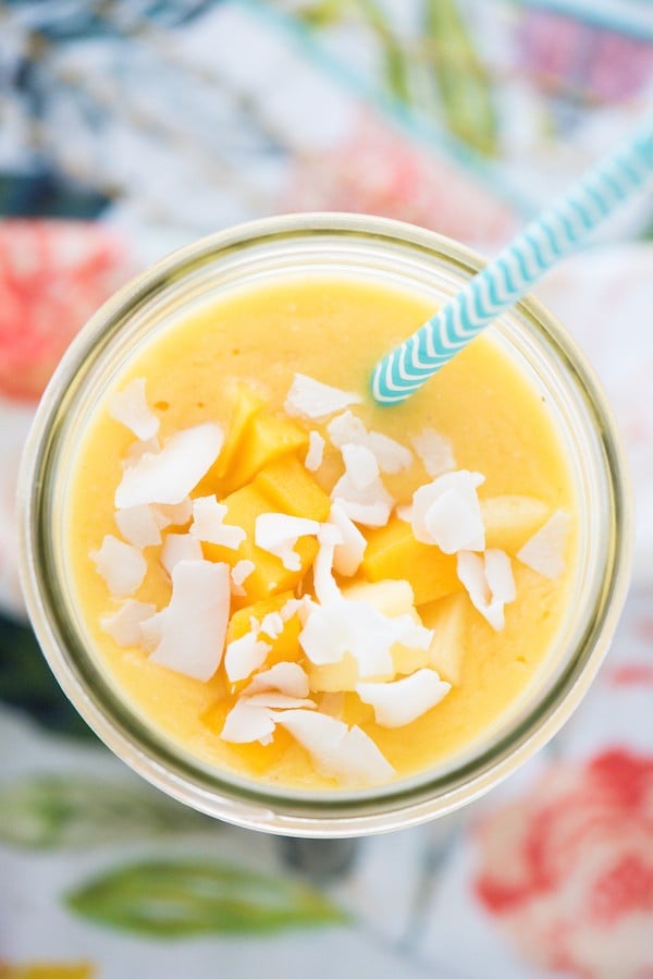 Tropical Sun Smoothie - Wake up your taste buds with this quick and healthful blender breakfast - a combination of pineapple, mango, banana, coconut and vanilla yogurt. | foxeslovelemons.com