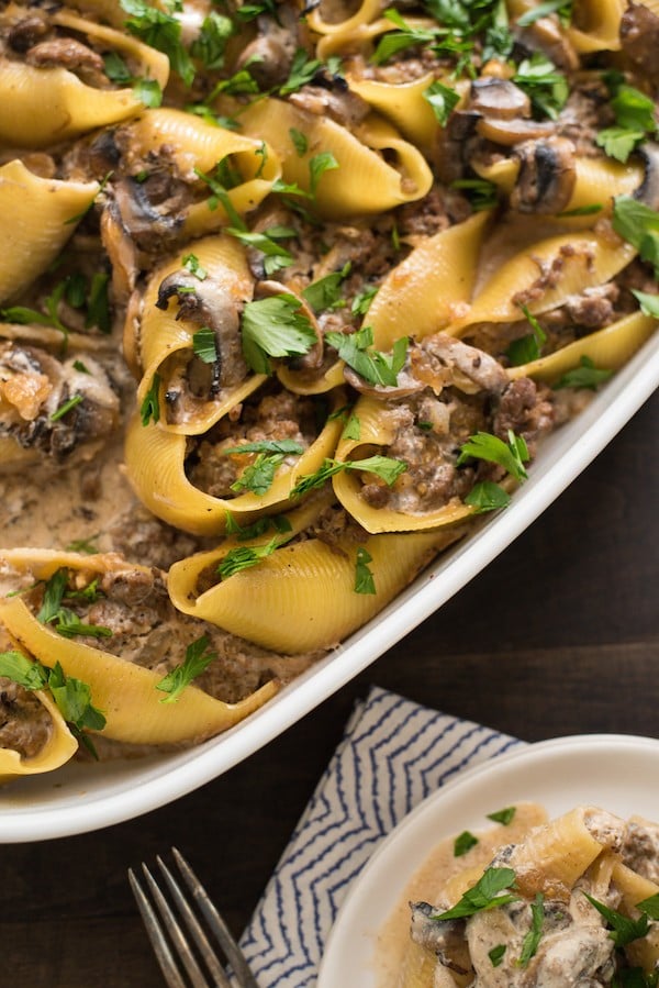 Beef Stroganoff Stuffed Shells - Take comfort food to the next level with this combination of stuffed shells and creamy beef and mushroom stroganoff! | foxeslovelemons.com