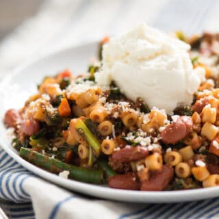 Minestrone Pasta Sauté with Ricotta - All the good stuff from minestrone soup, served up in a skillet meal. Top with ricotta and parmesan cheese! | foxeslovelemons.com