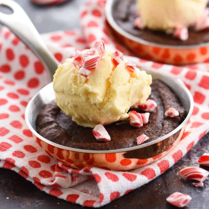 Double Peppermint Brownie Skillets for Two - Peppermint-infused brownies topped with vanilla ice cream and crushed candy cakes. Bake in mini skillets or ramekins for an adorable presentation! | foxeslovelemons.com