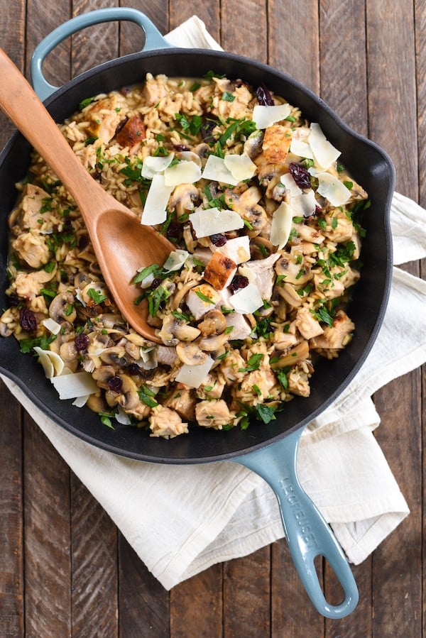 Turkey, Mushroom & Cranberry Risotto - Pure winter comfort food in a skillet. Arborio rice, sautéed mushrooms, turkey breast, dried cranberries and Parmesan cheese come together in this creamy, dreamy rice dish. | foxeslovelemons.com