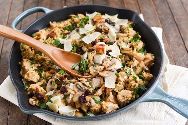 Turkey, Mushroom & Cranberry Risotto - Pure winter comfort food in a skillet. Arborio rice, sautéed mushrooms, turkey breast, dried cranberries and Parmesan cheese come together in this creamy, dreamy rice dish. | foxeslovelemons.com