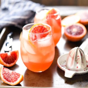 Blood Orange Sangria - Whip up this party-perfect big batch cocktail with just four simple ingredients! | foxeslovelemons.com