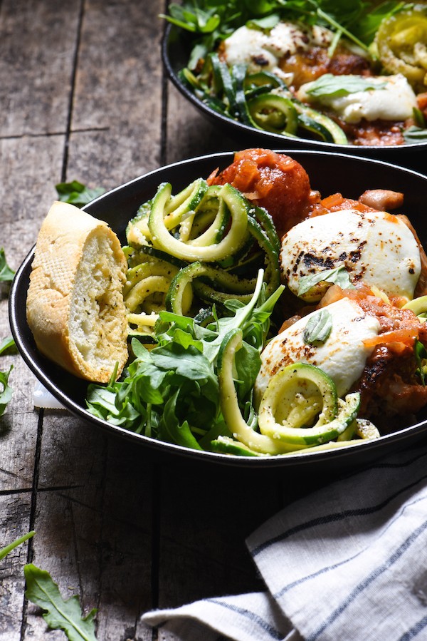 Caprese Braised Chicken with Cacio e Pepe Zucchini Noodles - A healthful, Italian-inspired meal in a bowl that is packed with veggies! | foxeslovelemons.com